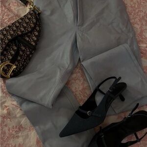 Vintage 70s blue genuine leather pants with a slight flare at the bottom.